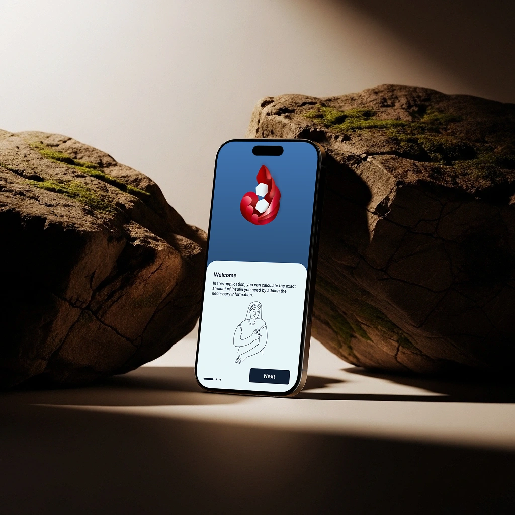 Insulin Dose Calculator app displayed on an iPhone between natural stones